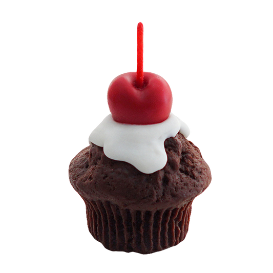 chocolate muffin candle with cherry on top