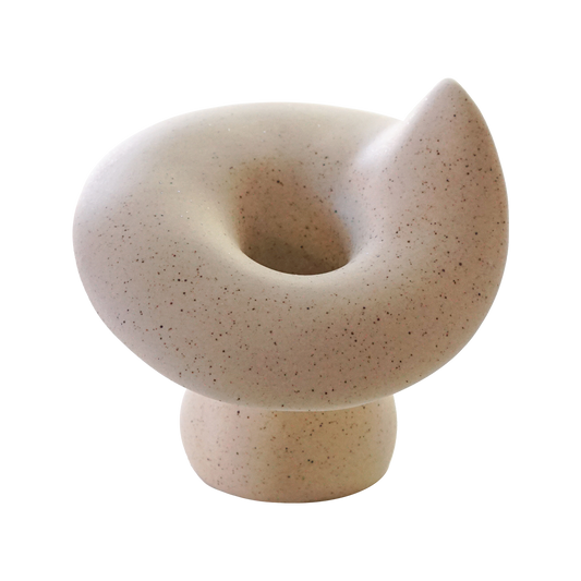 a dotted beige mushroom shape candle holder