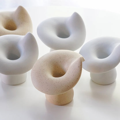 white mushroom ceramic candle holders and dotted beige mushroom shape candle holders