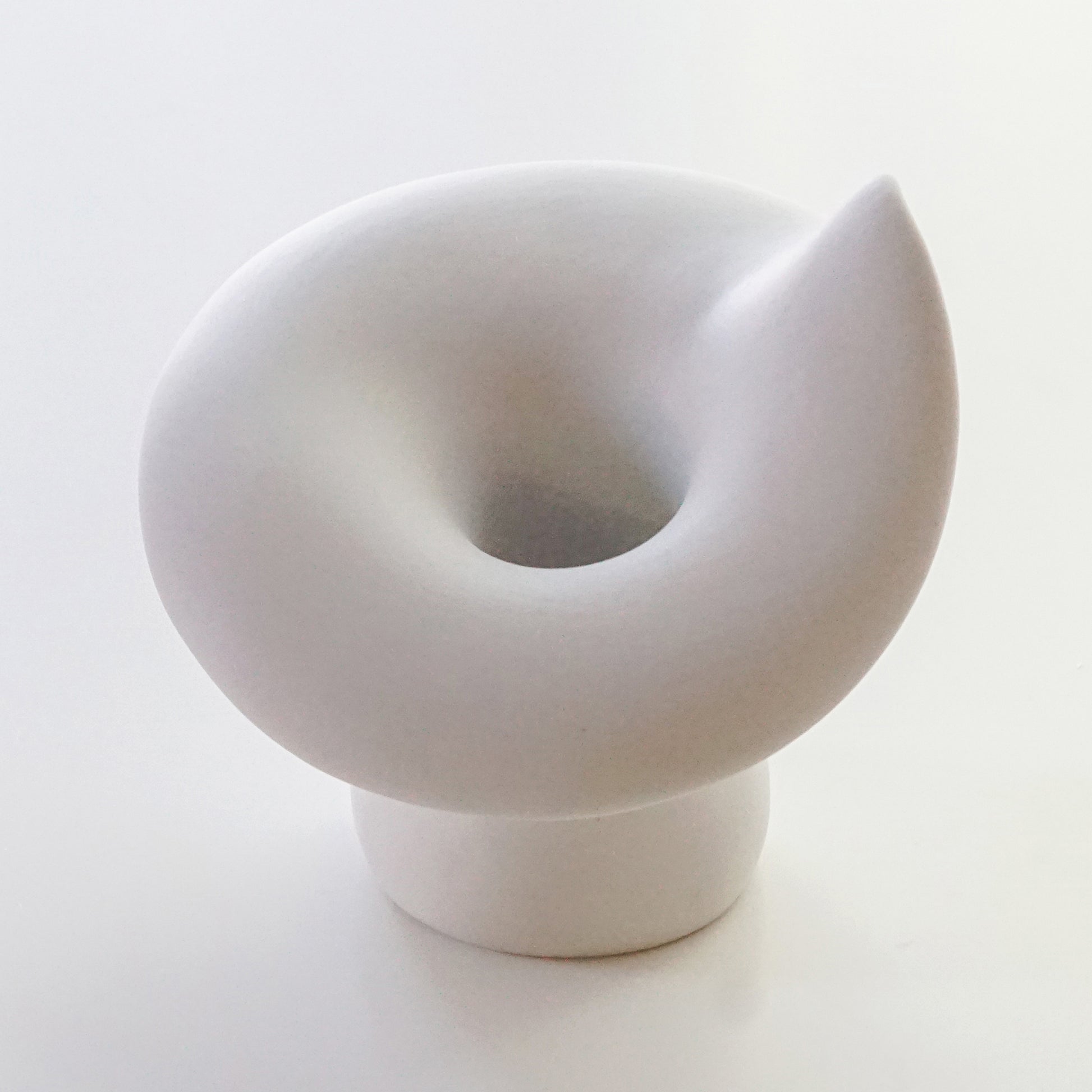 a white mushroom ceramic candle holder