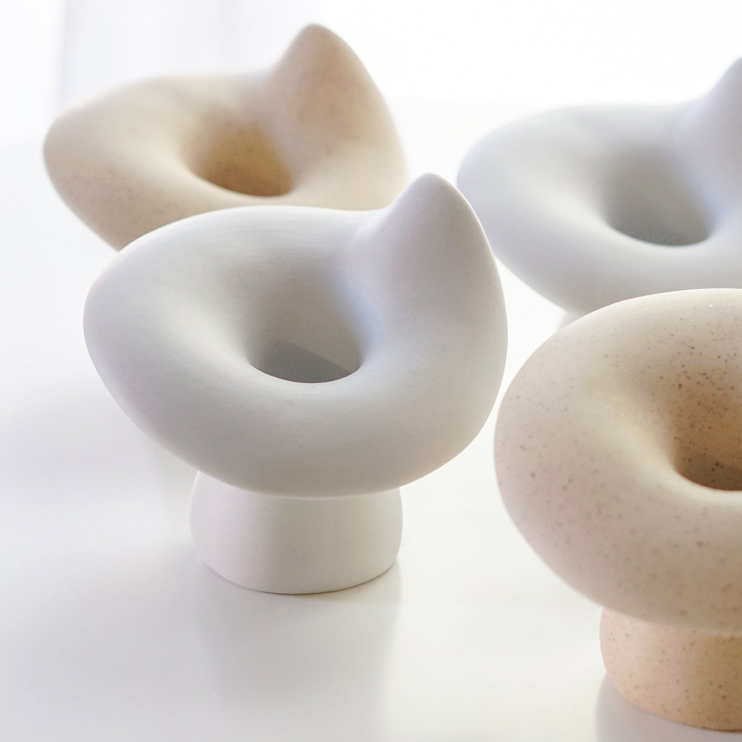 white mushroom ceramic candle holders and dotted beige mushroom shape candle holders