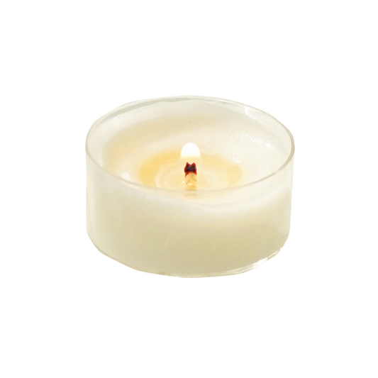 a lit tealight candle