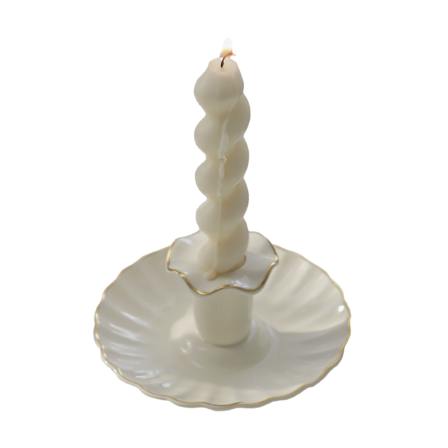 a lit white wavy spiral taper soy pillar candle in a white gold rim ruffle vintage candle holde