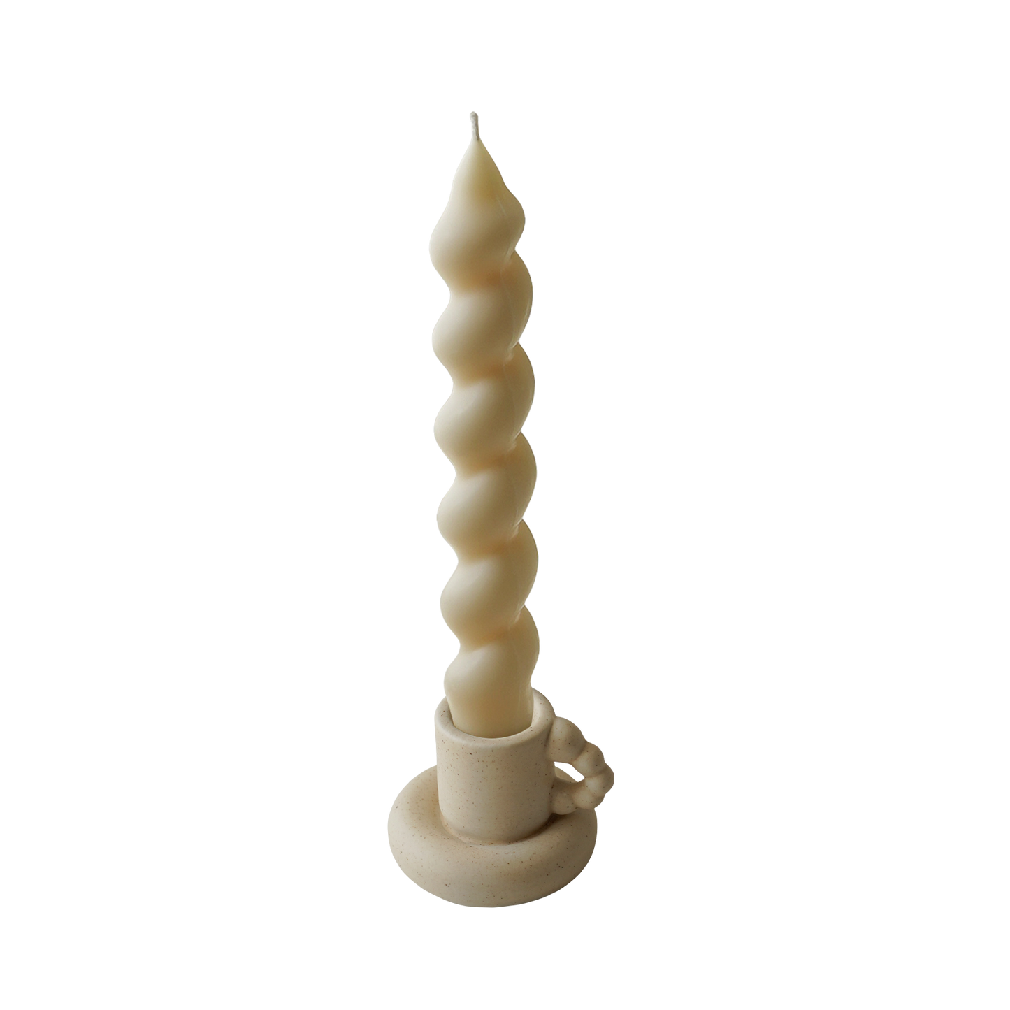 wavy spiral taper candle in a ceramic mug candle holder